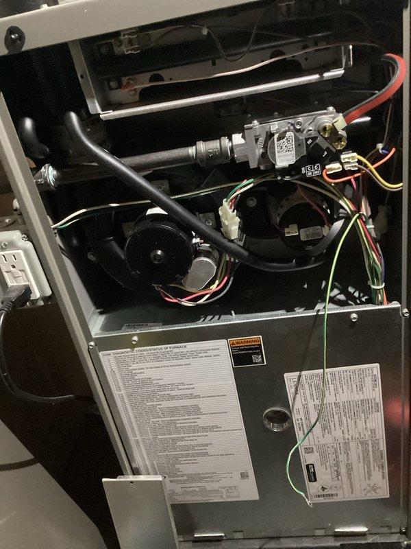 # Service Summary

Completed comprehensive ComfortGuard 5-Year Maintenance inspection on gas furnace system. Performed thorough examination of all critical components including burner assembly, heat exchanger, blower motor, gas valve, and electrical connections. Verified proper ignition sequence with all five burners lighting uniformly and maintaining stable blue pilot flames. Inspected and tested gas valve operation, confirmed secure connections on all gas piping, and verified proper wire terminations throughout the control circuit. Evaluated blower motor assembly for proper operation and checked all safety labels and warning placards for legibility. All components found operating within manufacturer specifications with no immediate service needs identified. Unit returned to full operational status.