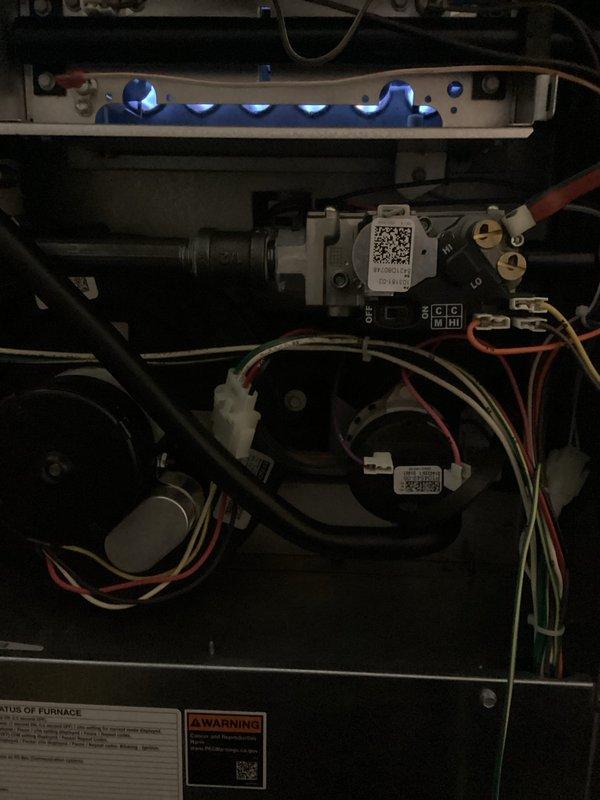 # Service Summary

Completed comprehensive ComfortGuard 5-Year Maintenance inspection on gas furnace system. Performed thorough examination of all critical components including burner assembly, heat exchanger, blower motor, gas valve, and electrical connections. Verified proper ignition sequence with all five burners lighting uniformly and maintaining stable blue pilot flames. Inspected and tested gas valve operation, confirmed secure connections on all gas piping, and verified proper wire terminations throughout the control circuit. Evaluated blower motor assembly for proper operation and checked all safety labels and warning placards for legibility. All components found operating within manufacturer specifications with no immediate service needs identified. Unit returned to full operational status.
