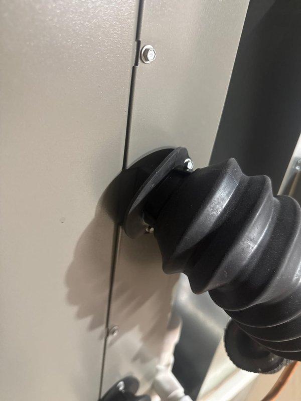 Completed violation repair callback on recently installed HVAC system to address unsealed insulation at evaporator coil elbow and flex connection points. Properly sealed all insulation gaps at evaporator connections and secured flexible duct boots to coil assembly per code requirements, ensuring complete thermal barrier and proper system operation.