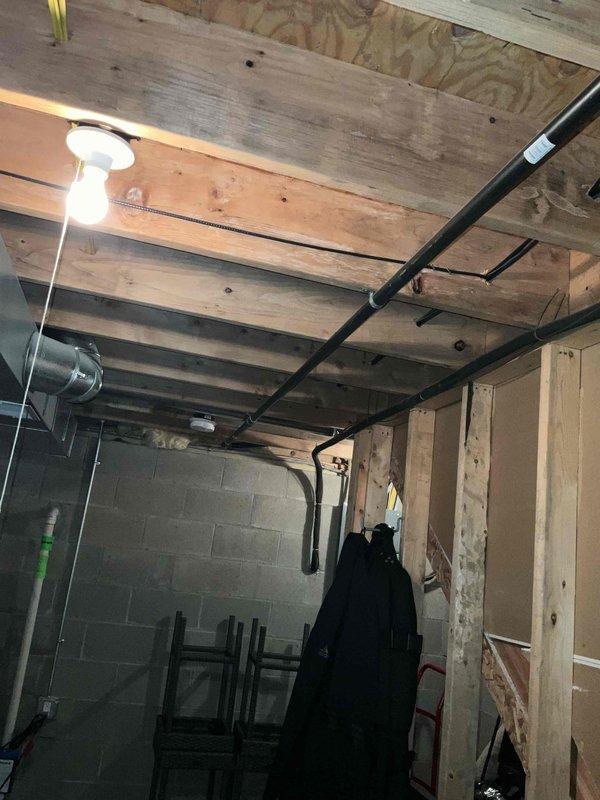 Provided comprehensive electrical estimate for new whole home Kohler generator installation at a 2-story residential property. Assessed existing electrical service panel located in unfinished basement with exposed concrete block walls, evaluated current electrical infrastructure including main panel configuration and available capacity, and documented site conditions to determine optimal generator placement and integration requirements for complete home backup power system.