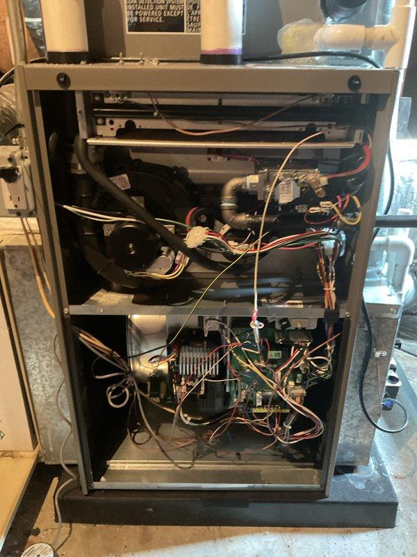 Completed annual furnace maintenance and tune-up on residential HVAC system as part of preventative Air Care Membership service. Performed comprehensive inspection of attic-mounted furnace and air handling unit, including examination of blower assembly, heat exchanger, electrical components, control boards, and all wiring connections. Verified proper operation of all mechanical and electrical systems, checked condensate drainage lines, and confirmed unit specifications meet manufacturer standards for optimal performance.