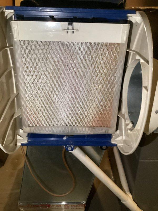 Completed annual furnace maintenance on basement-located HDF90-11 model unit as part of preventative care membership. Performed comprehensive tune-up including inspection of blower motor assembly, gas valve connections, electrical wiring, and all internal components with access panel removed. Inspected and evaluated integrated humidifier unit with mesh filter pad and associated PVC drainage lines, confirming all systems operating within normal parameters with no issues identified.