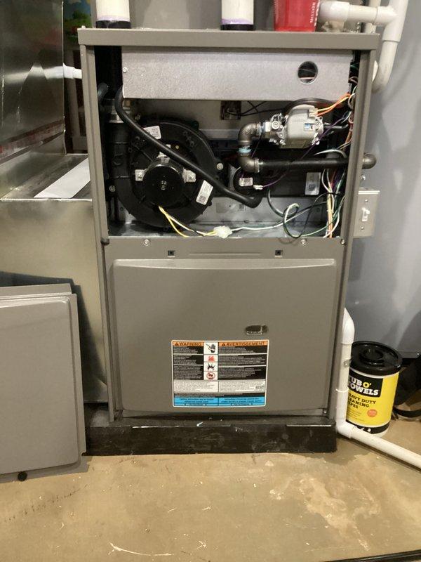 # Annual Furnace Maintenance Completed

Performed comprehensive annual heating maintenance on a 10-year-old residential furnace system per membership agreement. Conducted complete system inspection with front panel removal to access all internal components. Verified proper operation of draft inducer motor assembly, blower motor, and all electrical connections. Performed electrical diagnostics using clamp meter to measure current draw on system components, confirming all readings within manufacturer specifications. Inspected and tested control board, wiring harness, and safety devices. System found operating properly with no deficiencies noted. Unit returned to normal service.