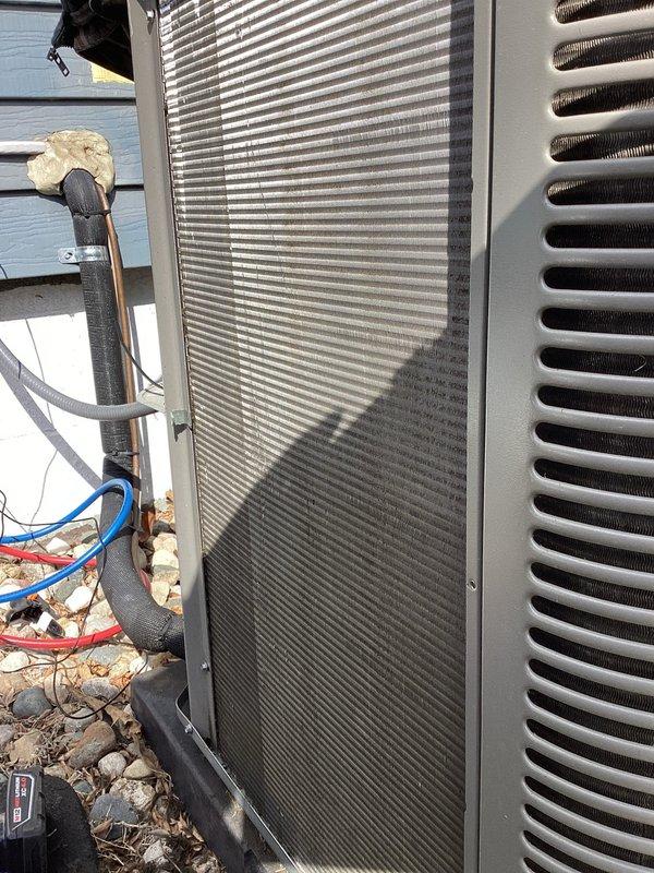 Completed routine Air Care Maintenance inspection on residential HVAC system. Installed cover plate for exposed electrical wiring at junction box above furnace in attic space as requested by homeowner to improve safety and appearance. Inspected outdoor condensing unit, verified refrigerant lines and service ports, confirmed system operational status.