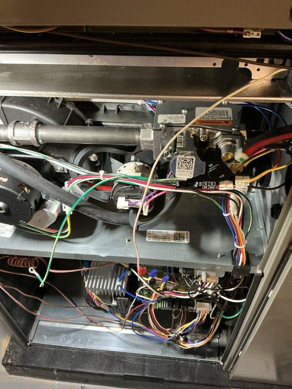 Completed annual furnace maintenance inspection per membership agreement on brand new furnace system. Performed comprehensive tune-up including visual inspection of all internal components, gas valve assembly, blower motor, heat exchanger, burner assembly, electrical connections, and control board. Verified proper wiring connections across all circuits, checked condensate drainage system, and documented equipment condition with photos showing minimal dust accumulation consistent with new installation. All components operating within manufacturer specifications with no issues found.