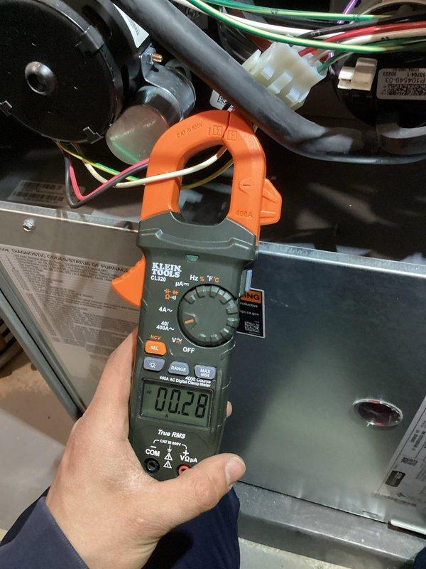 Completed complimentary annual furnace maintenance as part of membership program on a new furnace installation. Performed comprehensive tune-up including visual inspection of all system components, electrical connections, and wiring. Used digital clamp meter to verify proper amperage draw and electrical performance of the blower motor and control circuits. All readings were within manufacturer specifications. Inspected air handler cabinet, control board, and associated wiring harness for proper connections and operation. System operating efficiently with no deficiencies noted.