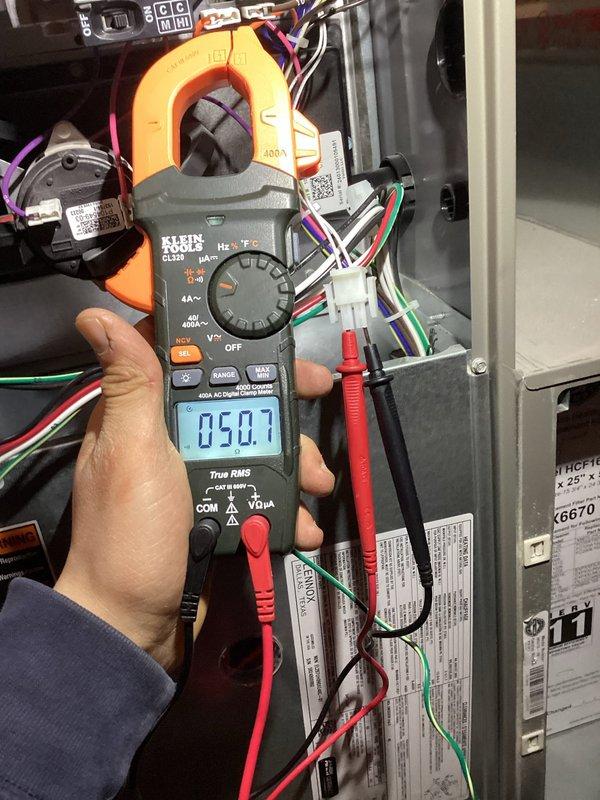Completed complimentary annual furnace maintenance as part of membership program on a new furnace installation. Performed comprehensive tune-up including visual inspection of all system components, electrical connections, and wiring. Used digital clamp meter to verify proper amperage draw and electrical performance of the blower motor and control circuits. All readings were within manufacturer specifications. Inspected air handler cabinet, control board, and associated wiring harness for proper connections and operation. System operating efficiently with no deficiencies noted.