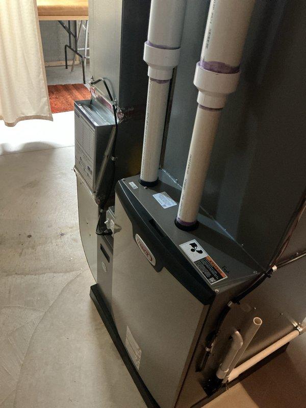 Completed complimentary annual furnace maintenance on Lennox heating system as part of preventative maintenance membership program. Performed comprehensive tune-up inspection on recently installed furnace unit (0 years old), verifying proper operation of all components, checking PVC venting connections, and ensuring system is running efficiently for the heating season. All equipment found in excellent condition with no issues identified during inspection.