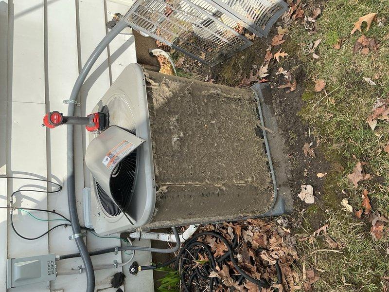 Completed annual preventive maintenance on residential split system air conditioning unit. Upon arrival, found outdoor condenser unit heavily soiled with accumulated dirt, debris, and organic matter on exterior surfaces and coil fins. Performed thorough cleaning of condenser coil and exterior cabinet. Inspected all electrical connections and refrigerant lines for proper condition. Measured and recorded operating temperatures using calibrated digital thermometer, with readings within normal parameters. Verified proper operation of condenser fan motor and compressor. System tested and confirmed operational for cooling season.