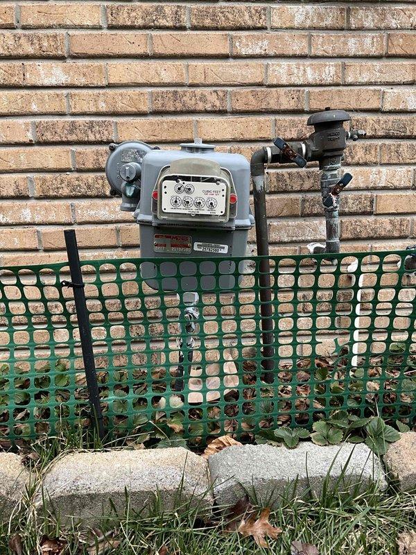 Performed full system estimate for 1700 square foot ranch home with full basement. Evaluated existing 1999 HVAC system with failed furnace control board and determined 80% efficiency furnace is worn out and not cost-effective to repair. Air conditioning unit remains operational. Documented natural gas meter installation and deteriorated ductwork showing significant structural damage including horizontal cracking, paint failure, and corrosion. Provided replacement system options for complete HVAC upgrade.