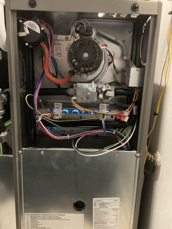 Completed annual furnace maintenance and tune-up on two residential furnace units. Performed comprehensive inspection of all internal components including blower motor assembly, gas valve connections, electrical wiring, control board, and safety mechanisms. Verified proper operation of both systems with access panels opened for thorough examination of burner components, heat exchangers, and ventilation connections. Documented system conditions with photographs showing clean interior components, properly routed wiring harnesses, and operational pressure readings. All systems operating within normal parameters with no issues identified during maintenance visit.