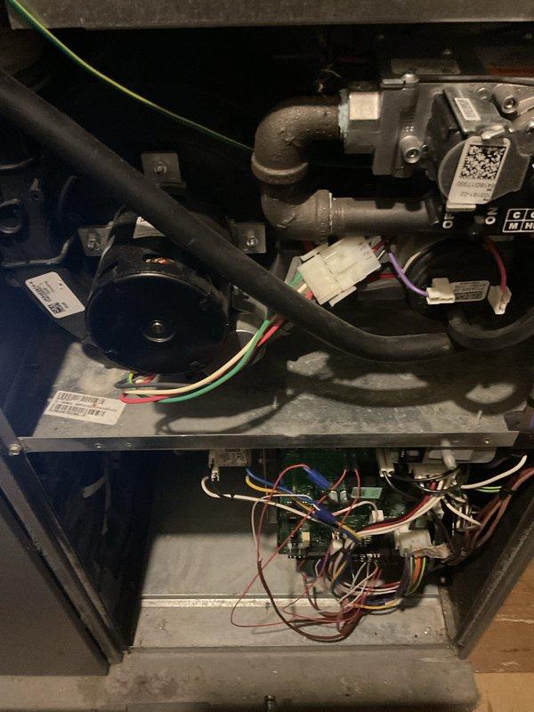 Completed routine annual heating maintenance and tune-up on furnace system. Performed comprehensive inspection of gas valve assembly, blower motor, electrical control board, and all associated wiring connections. Verified proper operation of all mechanical and electrical components, checked gas connections for integrity, and documented system condition with photographs. All components found to be in good working order with no issues identified.