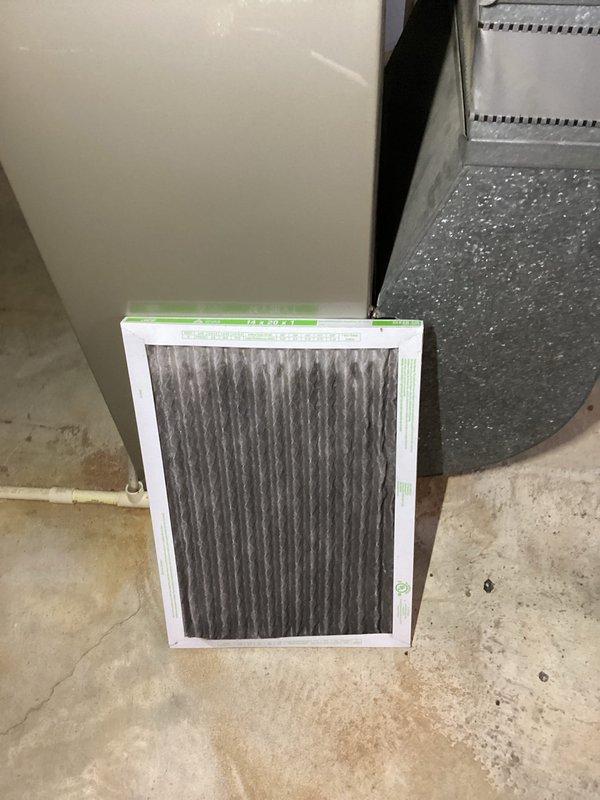 Responded to service call for furnace cycling on and off intermittently in basement installation. Performed diagnostic inspection of gas furnace system including visual examination of blower assembly, gas valve, control module, and electrical connections. Inspected all wiring harnesses and safety controls for proper operation and secure connections. Evaluated air filter condition and verified adequate airflow through system. Documented equipment configuration and current operating conditions with photographic records of internal components and filtration system.