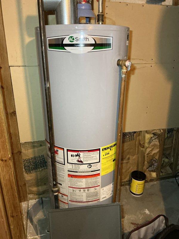 Completed scheduled HVAC maintenance inspection including temperature diagnostics of ductwork system, recording supply air temperature of 126.5°F to verify proper heating operation. Performed visual inspection of AO Smith water heater, checking copper piping connections, pressure relief valve, and overall unit condition as part of comprehensive mechanical systems evaluation.