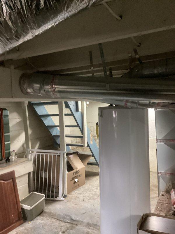 Completed full HVAC system installation in basement mechanical room, including 70,000 BTU furnace and 2.5 ton air conditioning unit with rear discharge configuration. Installed new furnace on platform with proper PVC venting, connected metallic ductwork with insulated liner, and ran new dedicated electrical circuit to equipment. Obtained mechanical and electrical permits prior to installation, and all required paperwork has been finalized.