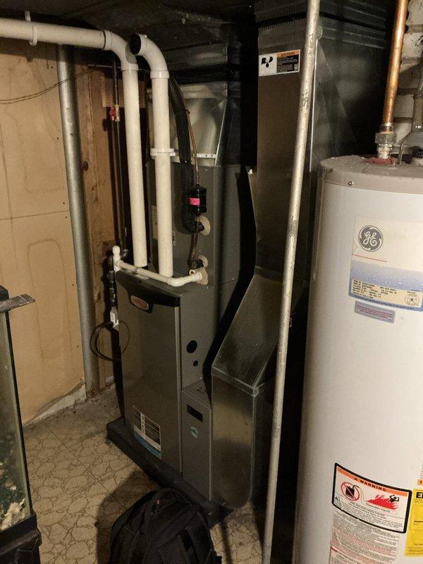 Completed annual heating maintenance and tune-up on residential furnace system under Air Care Membership coverage. Performed comprehensive inspection of furnace unit, blower motor assembly, gas valve components, and electrical connections. Verified all wiring harnesses, control mechanisms, and safety systems operating within manufacturer specifications. Inspected PVC venting system and condensate drainage. All components found in proper working order with no deficiencies noted. System tested and confirmed ready for heating season operation.