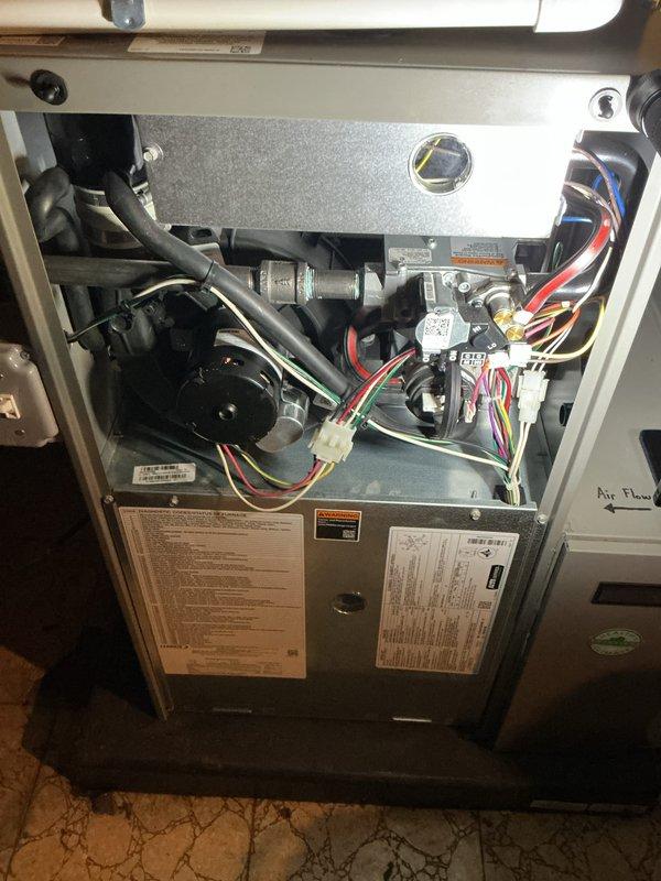 Completed annual heating maintenance and tune-up on residential furnace system under Air Care Membership coverage. Performed comprehensive inspection of furnace unit, blower motor assembly, gas valve components, and electrical connections. Verified all wiring harnesses, control mechanisms, and safety systems operating within manufacturer specifications. Inspected PVC venting system and condensate drainage. All components found in proper working order with no deficiencies noted. System tested and confirmed ready for heating season operation.