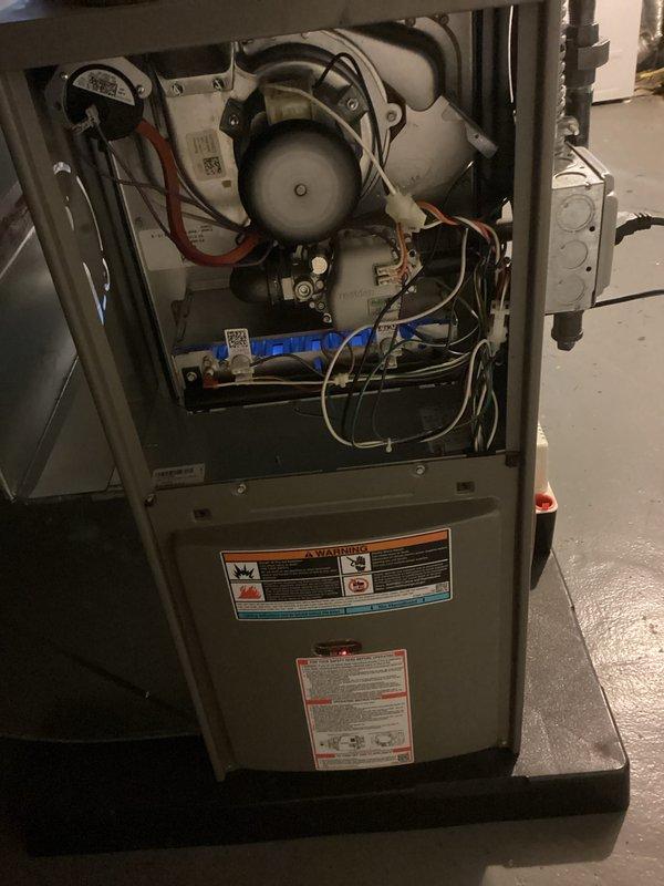 Completed scheduled Air Care Heating recurring maintenance service on Lennox furnace unit. Performed comprehensive system inspection with access panel removed to evaluate blower motor assembly, electrical connections, capacitor, and internal components. All wiring connections, safety controls, and operational components were inspected and found to be in proper working condition, with photographic documentation captured for service records.