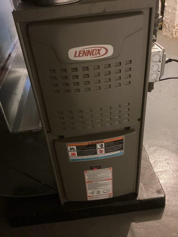 Completed scheduled Air Care Heating recurring maintenance service on Lennox furnace unit. Performed comprehensive system inspection with access panel removed to evaluate blower motor assembly, electrical connections, capacitor, and internal components. All wiring connections, safety controls, and operational components were inspected and found to be in proper working condition, with photographic documentation captured for service records.