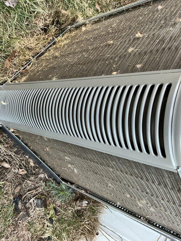 Completed annual heating system tune-up and maintenance inspection as part of preventative care membership. Performed comprehensive system evaluation including blower motor assembly, electrical connections, control board operation, and condensate drainage system. All components inspected and found operating within normal parameters; exterior ventilation grate and interior cabinet components documented with photos showing system in serviceable condition.