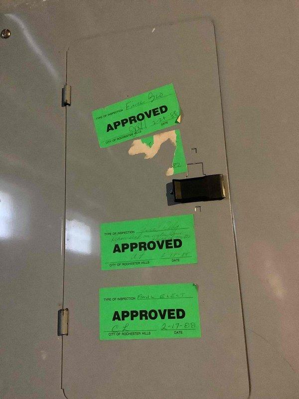 Conducted on-site assessment for electric vehicle charging station installation at detached garage and electrical panel upgrade requirements. Evaluated existing 100-amp basement electrical panel, photographed current configuration including panel condition, wiring routes through floor joists, and available pathways for new circuit installation to garage. Assessed electrical service capacity, panel space availability, and determined scope of work needed to accommodate Level 2 EV charger for incoming Chevrolet Equinox EV, including potential main service panel upgrade and dedicated circuit installation to detached garage structure.