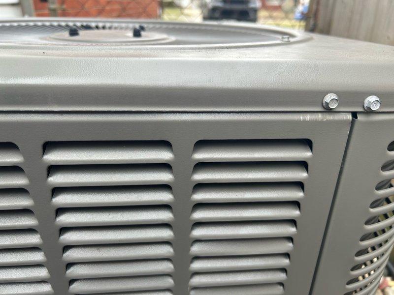 Performed routine AC maintenance on outdoor condensing unit. Inspected and painted electrical access door panel to prevent corrosion and maintain weather protection. Unit operational and in good working condition upon completion.