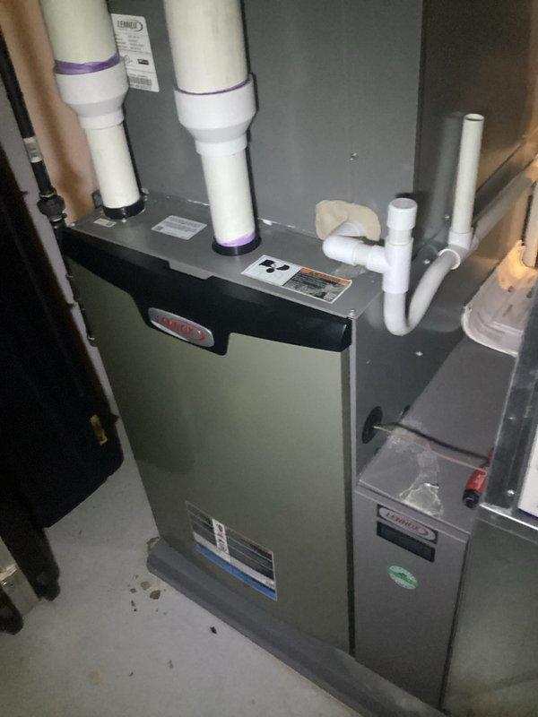 Completed complimentary annual heating maintenance on residential furnace system. Performed comprehensive tune-up inspection of all major components including blower assembly, heat exchanger, burner operation, and venting system. Verified proper operation of UV light system, inspected refrigerant lines and electrical connections, and confirmed all safety controls functioning correctly. No issues identified during inspection; unit operating within manufacturer specifications. System ready for heating season.