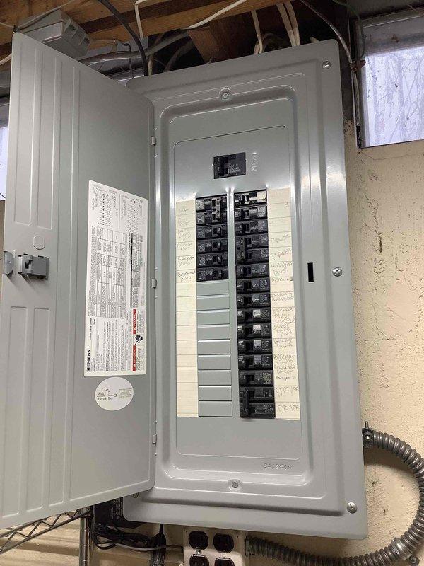 Completed electrical estimate for new whole home Generac generator installation at manufactured home residence. Assessed existing electrical panel configuration, verified circuit breaker capacity and available space for generator integration, and documented current electrical infrastructure including main service panel location in basement utility area with exposed conduit routing. Confirmed feasibility of generator connection to existing electrical system and provided comprehensive quote for complete installation including necessary transfer switch equipment and electrical connections to support automatic backup power system.