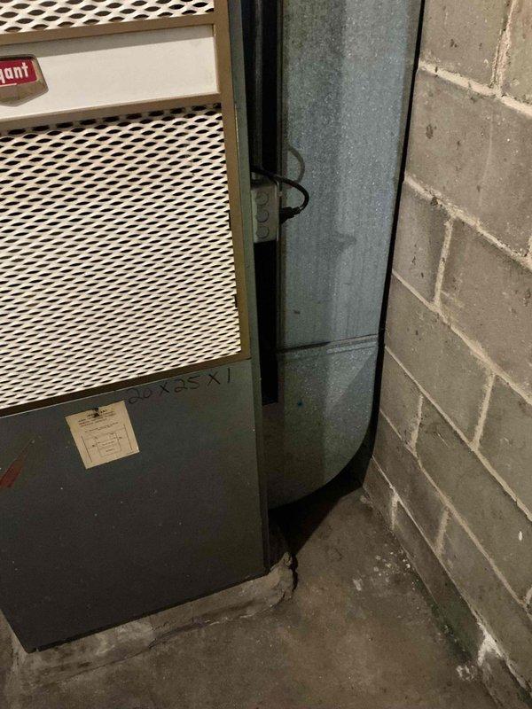 Provided equipment replacement estimate for 15-year-old furnace and air handler system located in basement mechanical room. Current natural gas-fired unit is operational but nearing end of service life. Documented existing equipment specifications, clearances, ductwork configuration, and electrical connections to prepare comprehensive replacement proposal for complete HVAC system upgrade.
