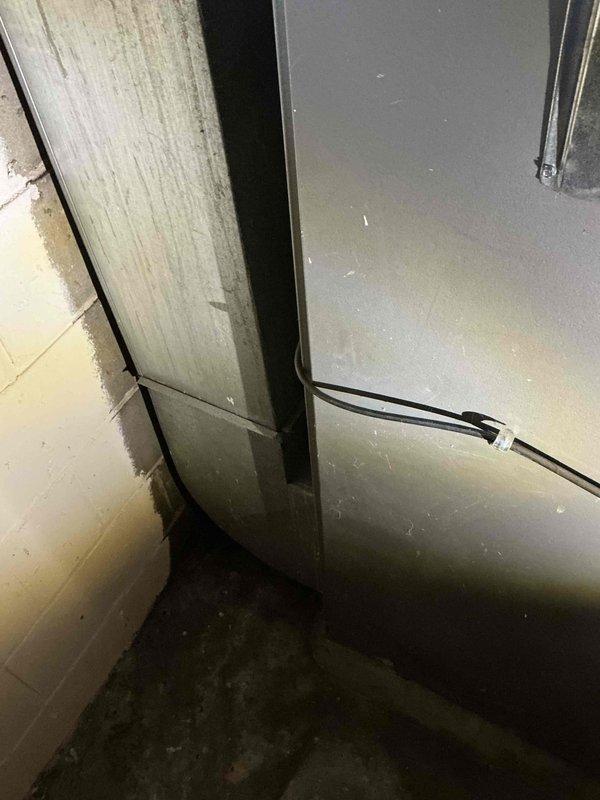 Provided equipment replacement estimate for 15-year-old furnace and air handler system located in basement mechanical room. Current natural gas-fired unit is operational but nearing end of service life. Documented existing equipment specifications, clearances, ductwork configuration, and electrical connections to prepare comprehensive replacement proposal for complete HVAC system upgrade.