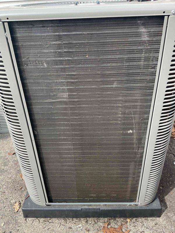 Completed scheduled air conditioning maintenance on outdoor condensing unit. Inspected system components and documented heavily soiled filter panel and condenser coil with significant dust, dirt, and debris accumulation restricting airflow. Unit requires replacement evaporative cooling pads and filters to restore proper system efficiency and performance.
