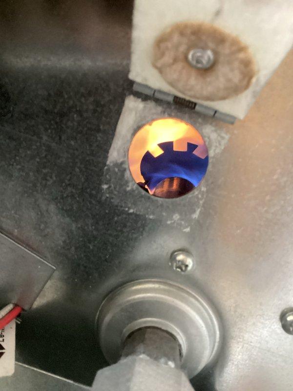 Completed annual furnace maintenance on newly installed unit. Performed comprehensive tune-up including inspection of burner assembly, heat exchanger, blower components, and all electrical connections. Verified proper combustion with clean blue-based flame pattern with yellow-orange tips indicating efficient gas burn. Inspected and documented all wiring connections, control boards, and safety devices throughout furnace cabinet. Checked ductwork connections and verified proper airflow. All systems tested and operating within manufacturer specifications. Unit left in proper working condition with no deficiencies noted.