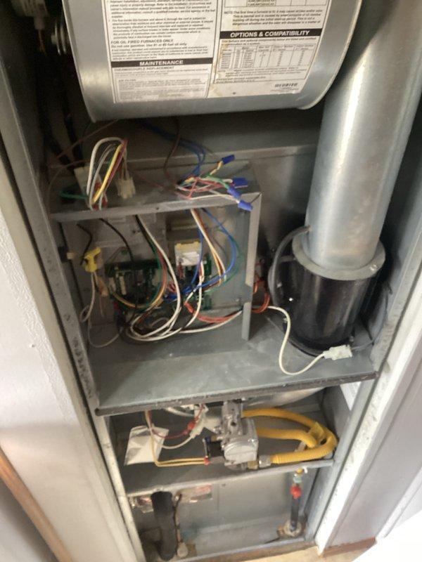 Completed annual furnace maintenance on newly installed unit. Performed comprehensive tune-up including inspection of burner assembly, heat exchanger, blower components, and all electrical connections. Verified proper combustion with clean blue-based flame pattern with yellow-orange tips indicating efficient gas burn. Inspected and documented all wiring connections, control boards, and safety devices throughout furnace cabinet. Checked ductwork connections and verified proper airflow. All systems tested and operating within manufacturer specifications. Unit left in proper working condition with no deficiencies noted.