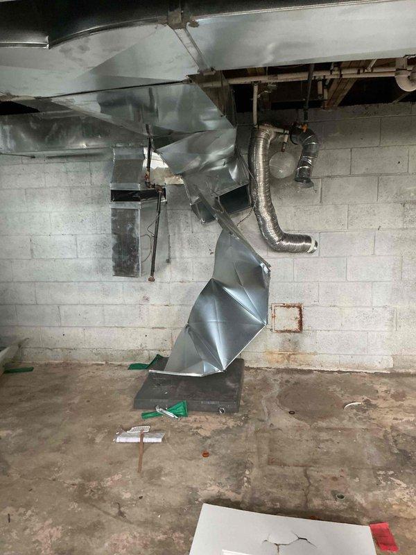 Conducted on-site assessment for furnace and hot water tank replacement in residential property with existing ductwork system in place. Evaluated basement mechanical room conditions, including galvanized steel ductwork configuration and infrastructure requirements. Documented current HVAC distribution system and prepared comprehensive estimate for new heating equipment and water heater installation.