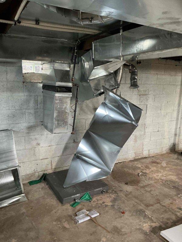 Conducted on-site assessment for furnace and hot water tank replacement in residential property with existing ductwork system in place. Evaluated basement mechanical room conditions, including galvanized steel ductwork configuration and infrastructure requirements. Documented current HVAC distribution system and prepared comprehensive estimate for new heating equipment and water heater installation.