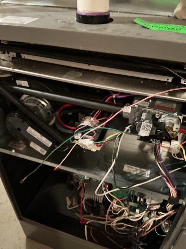 Completed complimentary annual furnace maintenance tune-up for Air Care Membership customer on a brand new furnace system. Performed comprehensive inspection of all internal components including gas valve assembly, electrical connections, blower motor housing, and control systems. All wiring connections, safety controls, and mechanical assemblies verified to be in proper working condition with no issues found.