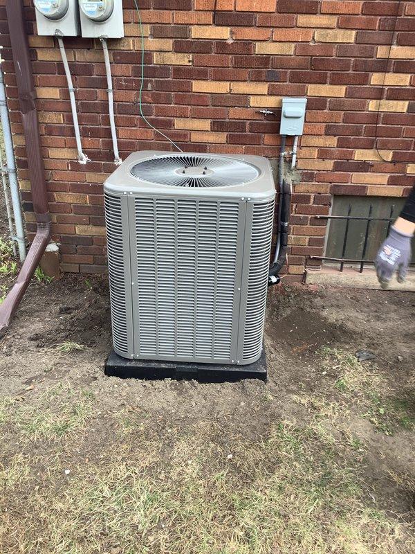 Completed full HVAC system installation including a 90,000 BTU furnace and 3-ton rear-discharge air conditioning unit. Installed humidifier, flue liner, and completed all necessary reconnections. Obtained mechanical and electrical permits prior to installation, ran PVC condensate drain lines, installed outdoor condenser unit on rubber pad with proper electrical disconnect, and ensured all components were properly mounted and secured to building exterior per code requirements.
