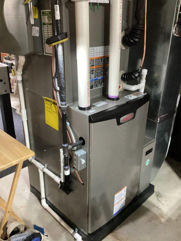 Completed annual furnace maintenance and tune-up on residential HVAC system per membership agreement. Performed comprehensive inspection of furnace unit, verified all manufacturer specifications, checked PVC venting connections, inspected refrigerant lines and insulation, examined flexible ductwork connections, and confirmed all system components were operating within normal parameters. No issues found; system in good working condition.