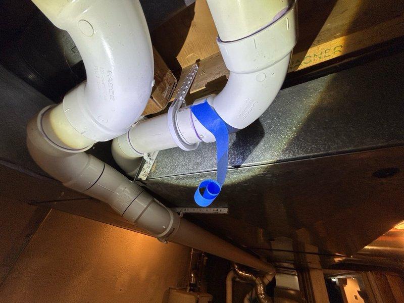 Replaced defective exhaust pipe on HVAC system in basement utility area. System tested and verified proper venting operation upon completion, with homeowner's authorized representative present to approve repair work.