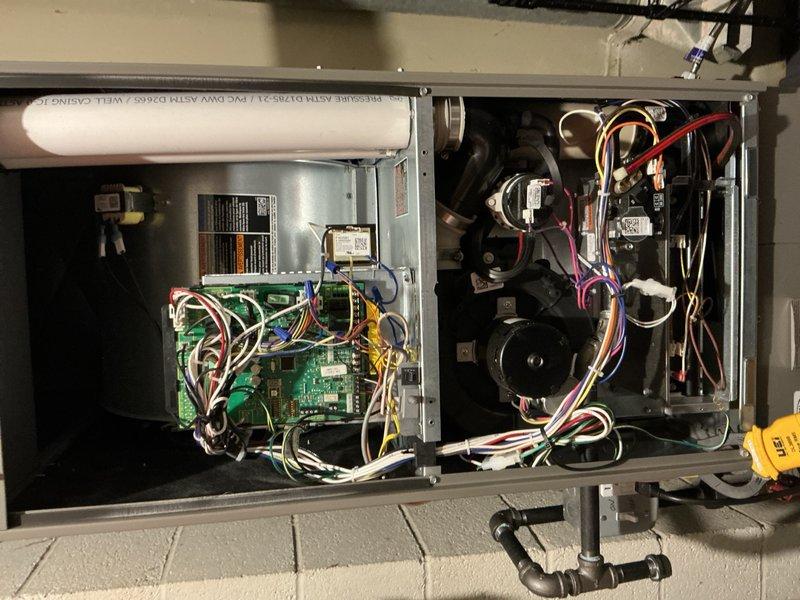 Completed annual furnace maintenance and tune-up on unit reported to be operating properly. Performed comprehensive system inspection including control board examination, electrical connections verification, blower assembly check, and all internal mechanical components. All wiring harnesses, transformers, and safety controls inspected and found secure. Blower motor and fan assembly operating within normal parameters. System tested and confirmed to be functioning correctly with no issues identified.