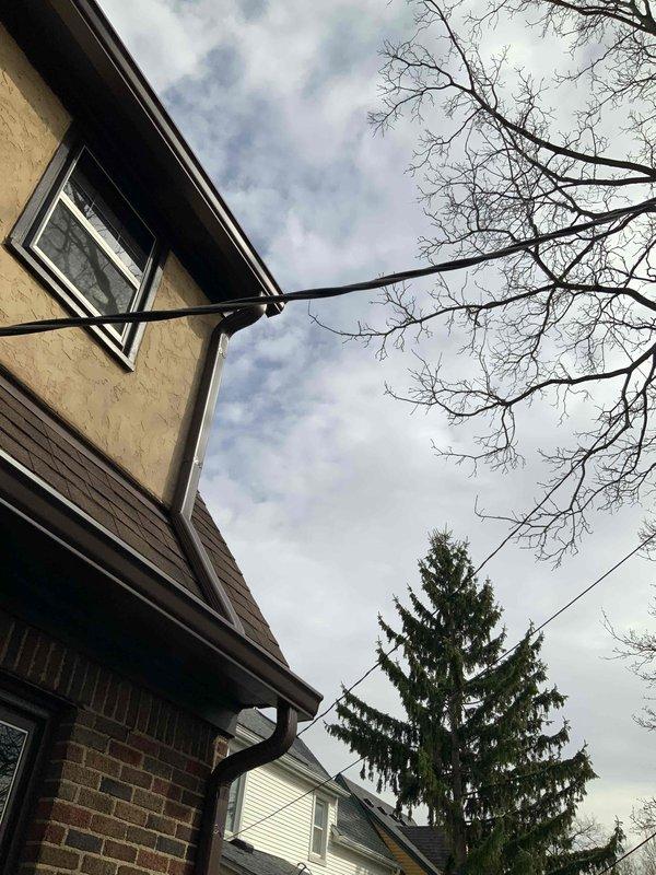 Conducted comprehensive electrical assessment of century-old residential property to evaluate panel capacity, wiring integrity, and safety compliance. Inspection revealed multiple code violations including absence of GFCI protection in kitchen areas, ungrounded two-prong outlets throughout living spaces, loose outlet connections, and flickering lights indicating potential circuit overload or deteriorated connections. Examined main electrical panel for adequate amperage capacity, breaker condition, and proper grounding; assessed branch circuit wiring for age-related deterioration, improper modifications, and aluminum wiring concerns common in older homes. Documented exterior service entrance equipment and overhead utility connections. Provided detailed estimate for panel upgrade to modern circuit breaker panel with appropriate amperage rating, installation of GFCI outlets in kitchen and bathroom areas per current NEC requirements, replacement of ungrounded outlets with properly grounded