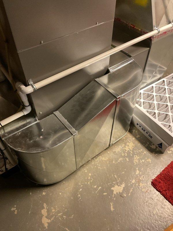 Responded to service call for furnace making noise during operation. Upon inspection of the 3-year-old unit located in basement, examined blower assembly, ductwork connections, and condensate drainage system. Verified proper operation of air handler, checked for loose components or debris in blower wheel, and inspected all mounting hardware for secure installation. System tested through complete heating cycle with no abnormal sounds detected at time of service. Unit operating within normal parameters under both part and labor warranty coverage.