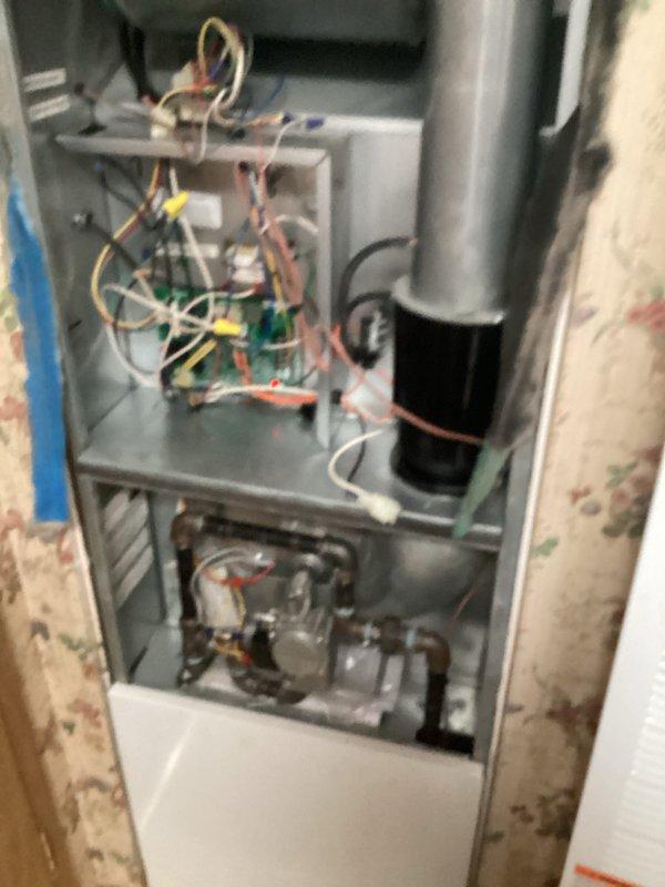 Completed annual heating maintenance on residential furnace system. Performed comprehensive tune-up including inspection of gas valve assembly, burner components, and heat exchanger. Verified proper operation of electronic control board and all electrical connections. Checked wiring integrity across all circuits including power, control, and safety connections. Inspected blower motor, capacitor, and associated mechanical components. All systems tested and confirmed operating within normal parameters. Unit currently functioning properly with no issues identified.