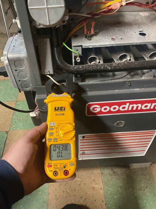 Performed comprehensive annual furnace maintenance on Goodman HVAC unit, including electrical diagnostics using digital multimeter to verify proper voltage readings and system performance. Inspected blower motor assembly, burner components, and all electrical connections; confirmed all wiring and internal components were functioning within normal parameters. Customer was informed that air conditioning maintenance is a separate service and was scheduled for a future reminder notification.