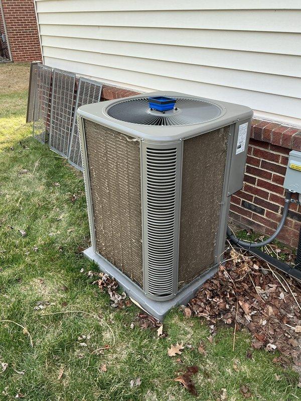 Performed routine Air Care Maintenance on residential air conditioning system. Inspected outdoor condensing unit, cleaned condenser coils, checked refrigerant levels, verified electrical connections at disconnect box, and tested system operation. Unit operating within normal parameters with no issues identified.