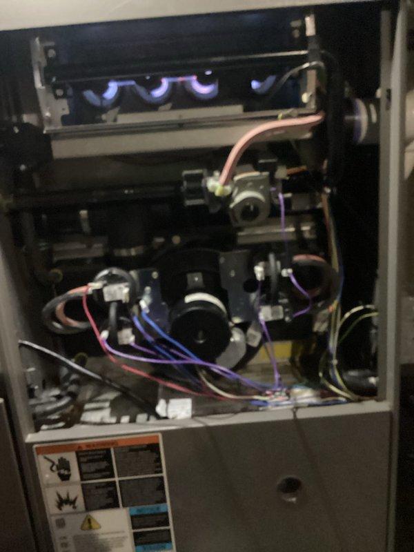 Performed annual maintenance on 10-year-old furnace unit operating properly at time of service. Conducted comprehensive tune-up including inspection of all major components. Removed and examined blower wheel assembly, verified proper mounting hub condition and spoke integrity. Inspected internal cabinet components including gas manifold, burner assembly, blower motor, electrical connections, and control modules. Verified all wire connections secure throughout system. Documented equipment condition with photographs. System tested and confirmed operational upon completion.