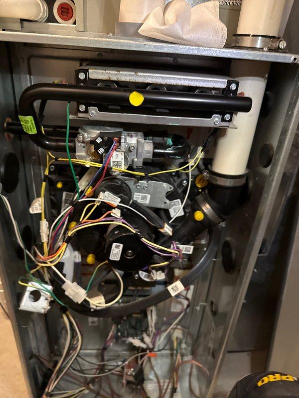 Completed annual furnace maintenance and tune-up on a new gas furnace system as part of preventative maintenance program. Performed comprehensive inspection of all internal components including heat exchanger, burner assembly, gas valves, blower motors, and electrical control modules. Verified proper operation of all safety controls, checked wire connections and harnesses throughout the unit, and ensured all components were secure and functioning correctly. All systems tested and operating within manufacturer specifications with no issues identified.