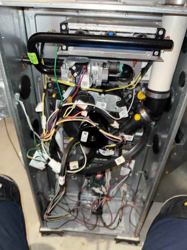 Completed annual furnace maintenance and tune-up on a new gas furnace system as part of preventative maintenance program. Performed comprehensive inspection of all internal components including heat exchanger, burner assembly, gas valves, blower motors, and electrical control modules. Verified proper operation of all safety controls, checked wire connections and harnesses throughout the unit, and ensured all components were secure and functioning correctly. All systems tested and operating within manufacturer specifications with no issues identified.