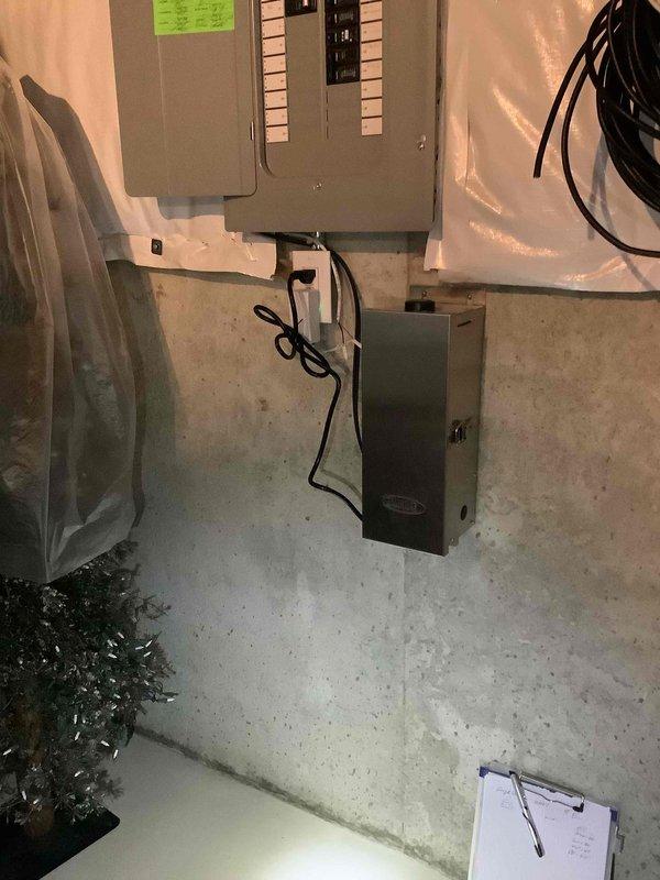 Completed electrical estimate for whole home generator installation at residential property. Assessed existing electrical panel configuration and available space in utility area for generator integration. Documented current electrical infrastructure including main service panel with circuit breakers and secondary subpanel installation, evaluated load capacity requirements, and determined optimal placement for transfer switch and generator connection points to ensure code-compliant installation.