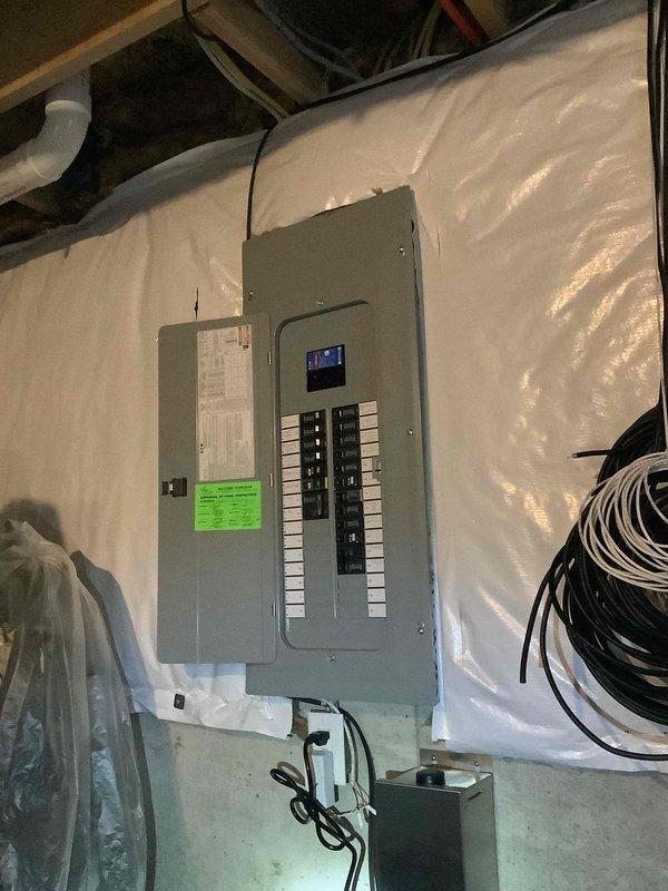 Completed electrical estimate for whole home generator installation at residential property. Assessed existing electrical panel configuration and available space in utility area for generator integration. Documented current electrical infrastructure including main service panel with circuit breakers and secondary subpanel installation, evaluated load capacity requirements, and determined optimal placement for transfer switch and generator connection points to ensure code-compliant installation.